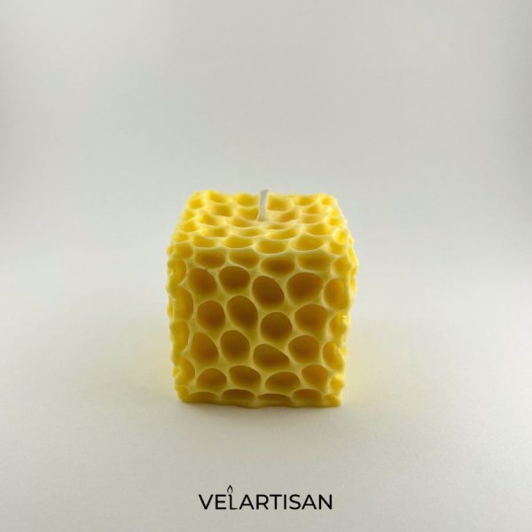 vela con forma de panal de abeja